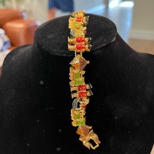 Avon Holiday toys slide charm bracelet New